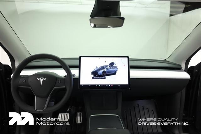 used 2024 Tesla Model Y car, priced at $41,999