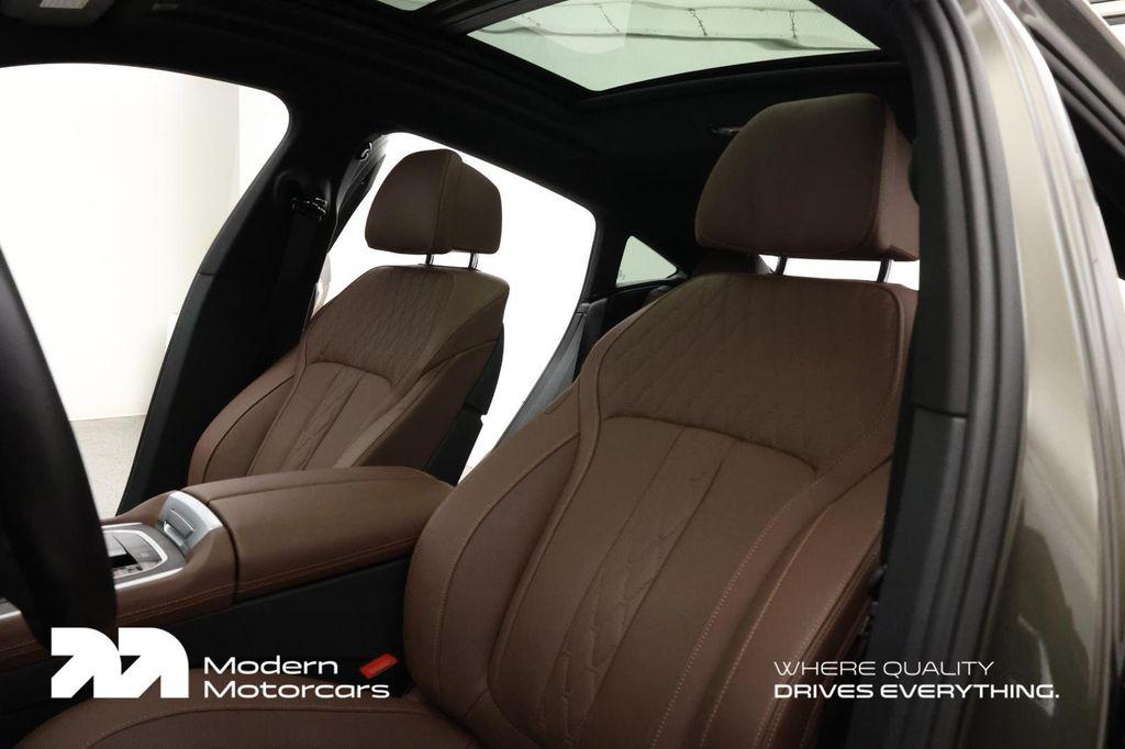 used 2024 BMW X6 car, priced at $79,999