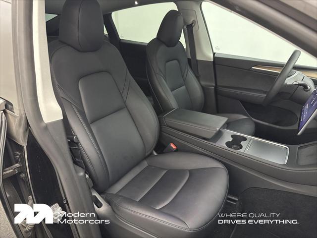 used 2023 Tesla Model Y car, priced at $32,999