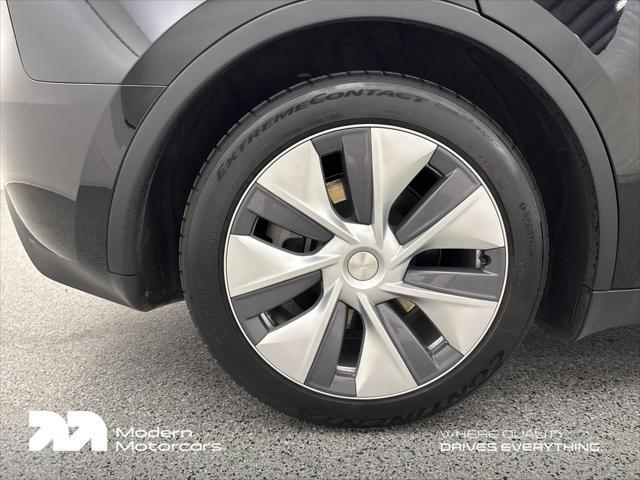 used 2023 Tesla Model Y car, priced at $32,999