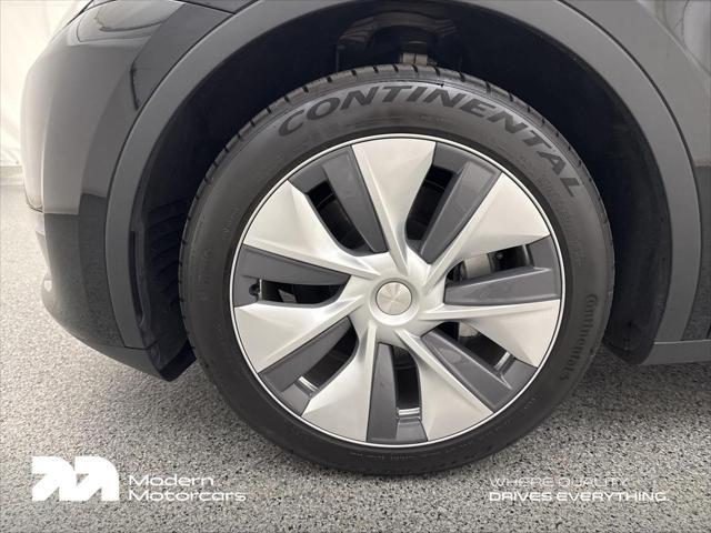used 2023 Tesla Model Y car, priced at $32,999