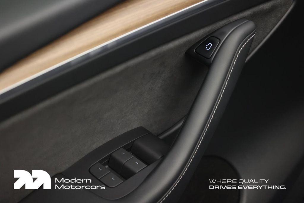 used 2023 Tesla Model Y car, priced at $32,999