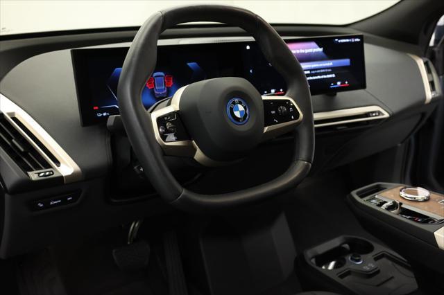 used 2023 BMW iX car, priced at $56,999