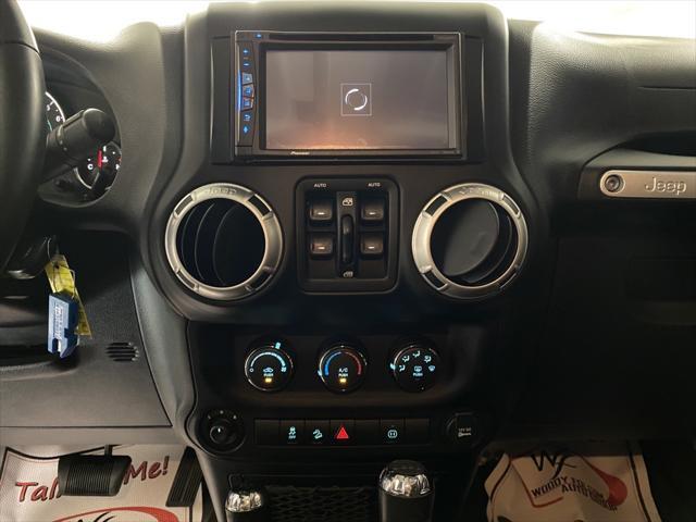 used 2012 Jeep Wrangler Unlimited car, priced at $39,997