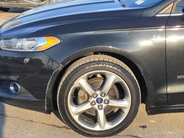 used 2014 Ford Fusion Hybrid car, priced at $6,000