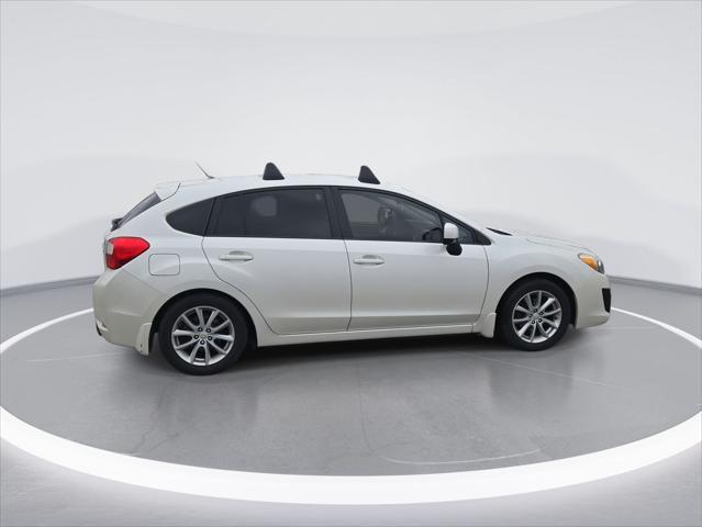 used 2012 Subaru Impreza car, priced at $10,000