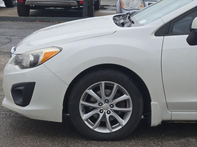 used 2012 Subaru Impreza car, priced at $10,000