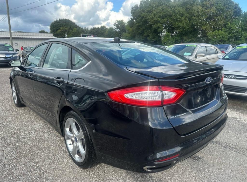 used 2015 Ford Fusion car, priced at $3,400