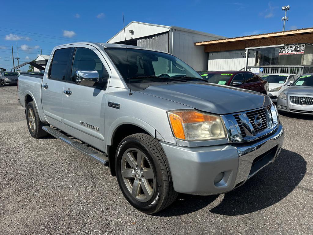 used 2010 Nissan Titan car, priced at $5,600