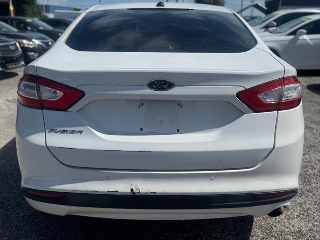 used 2013 Ford Fusion car, priced at $2,600