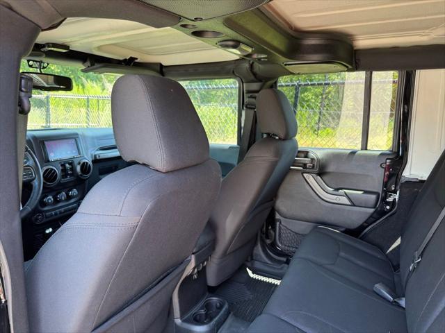 used 2016 Jeep Wrangler Unlimited car, priced at $16,878
