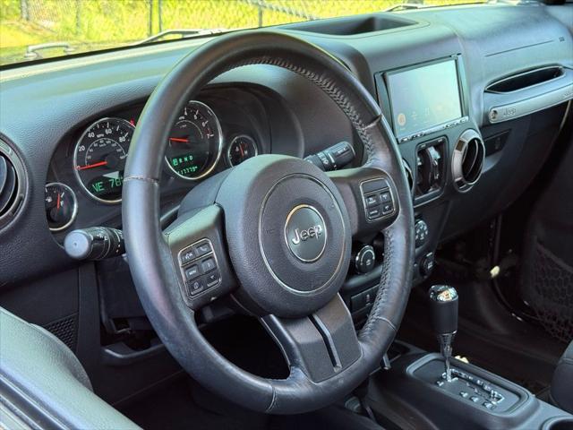 used 2016 Jeep Wrangler Unlimited car, priced at $16,878