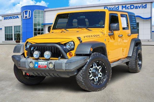 used 2012 Jeep Wrangler Unlimited car, priced at $16,196