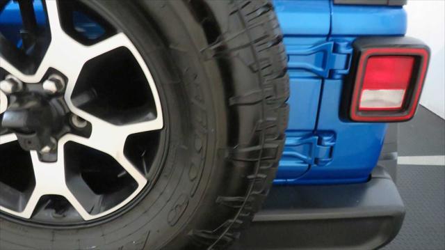 used 2021 Jeep Wrangler Unlimited car, priced at $43,671