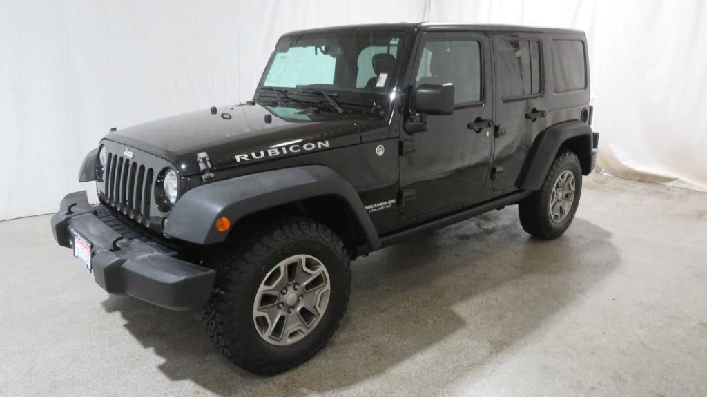 used 2015 Jeep Wrangler Unlimited car, priced at $23,796