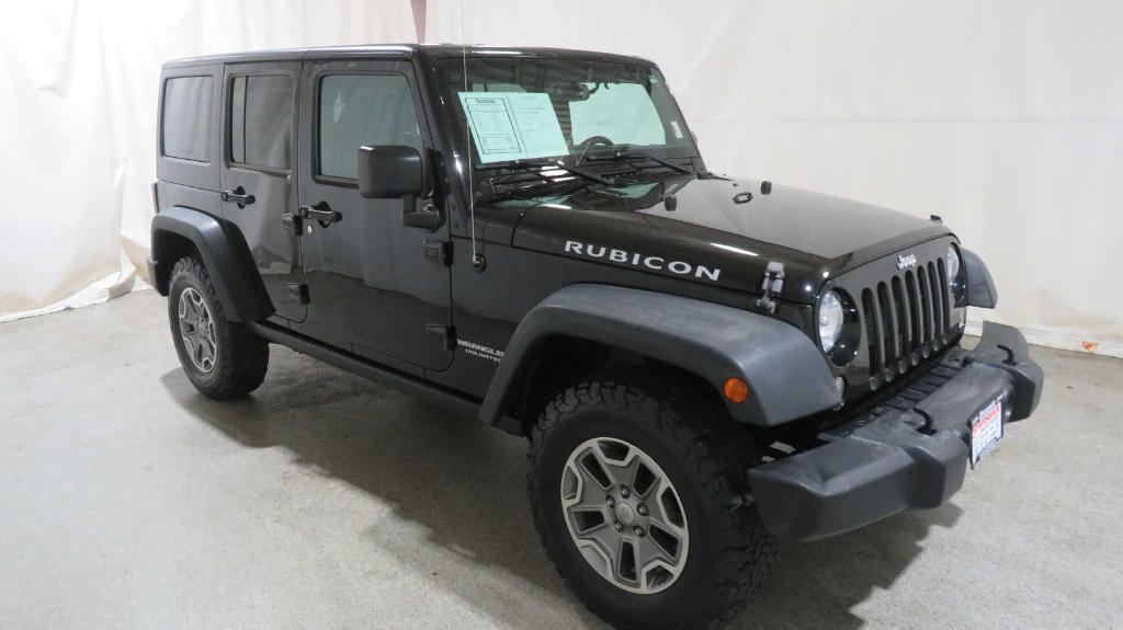 used 2015 Jeep Wrangler Unlimited car, priced at $23,796