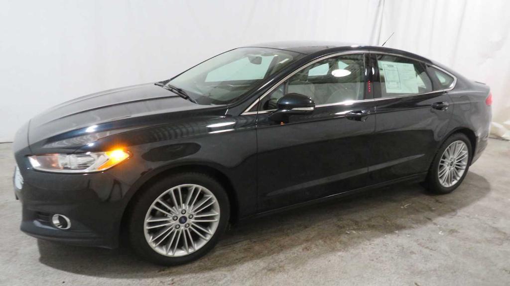 used 2014 Ford Fusion car, priced at $11,998