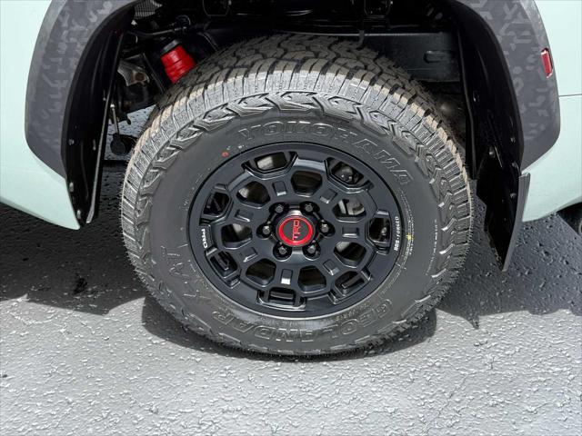 used 2022 Toyota Tundra Hybrid car, priced at $61,656