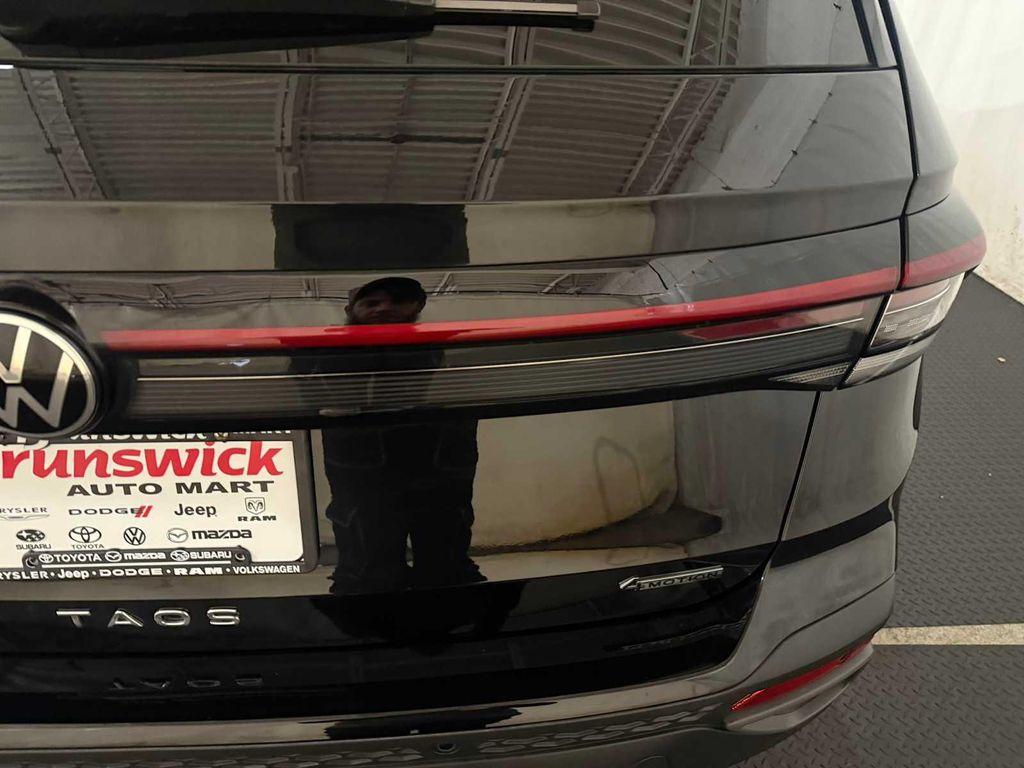 used 2025 Volkswagen Taos car, priced at $33,778