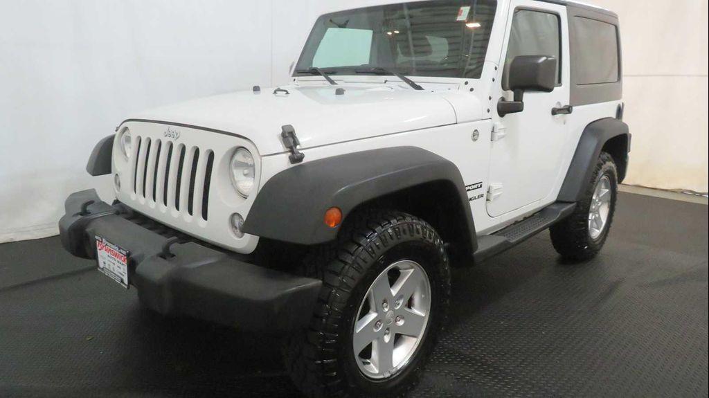used 2015 Jeep Wrangler car, priced at $16,421
