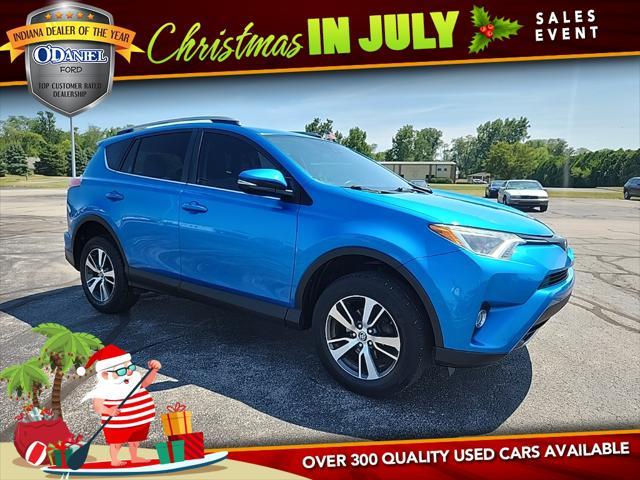 used 2018 Toyota RAV4 car, priced at $15,000