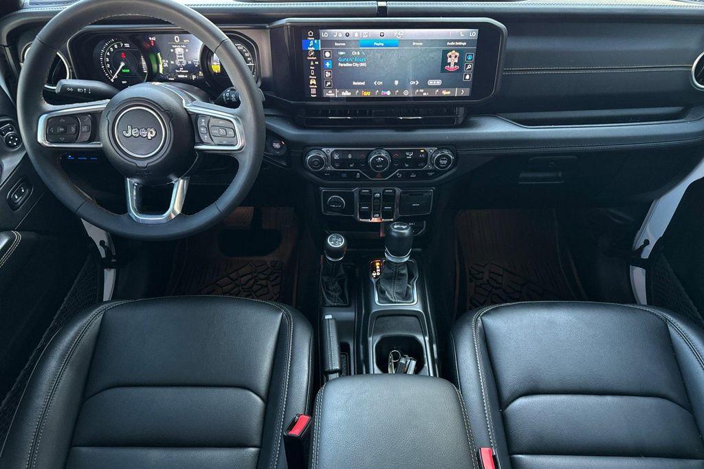 used 2024 Jeep Wrangler 4xe car, priced at $35,740