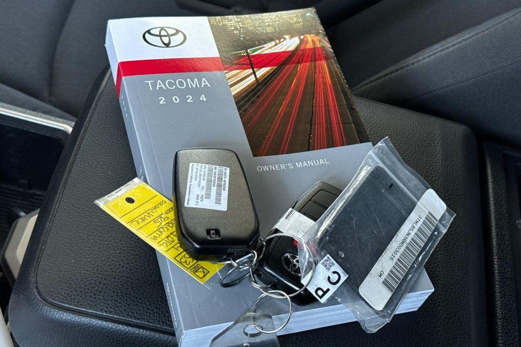 used 2024 Toyota Tacoma car, priced at $37,050