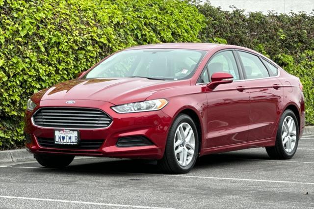 used 2014 Ford Fusion car, priced at $9,075