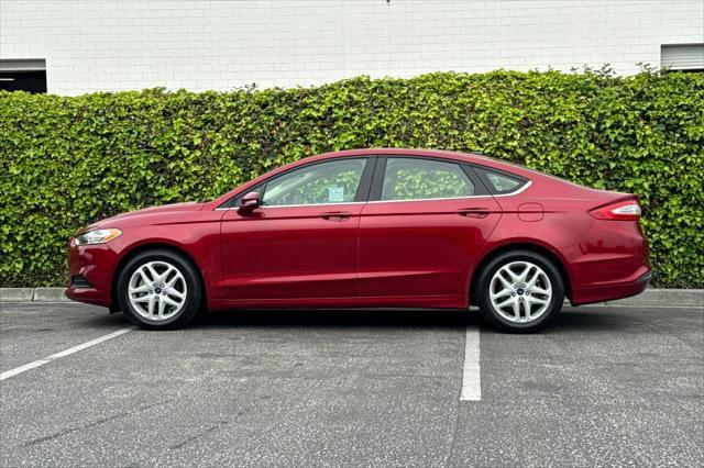 used 2014 Ford Fusion car, priced at $9,075