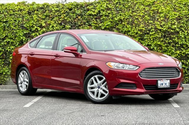 used 2014 Ford Fusion car, priced at $9,075