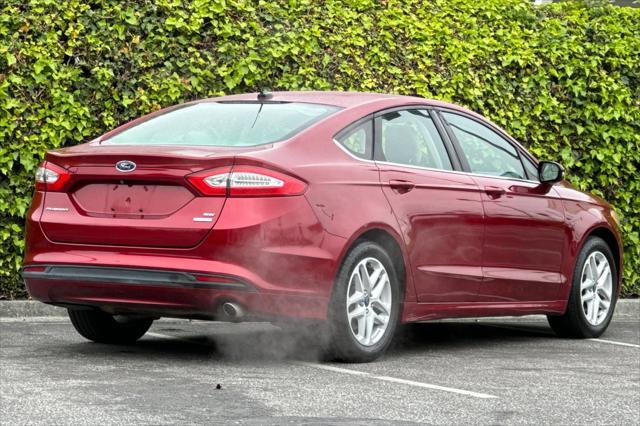 used 2014 Ford Fusion car, priced at $9,075