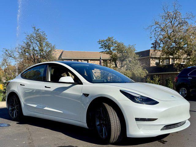 used 2023 Tesla Model 3 car, priced at $28,432