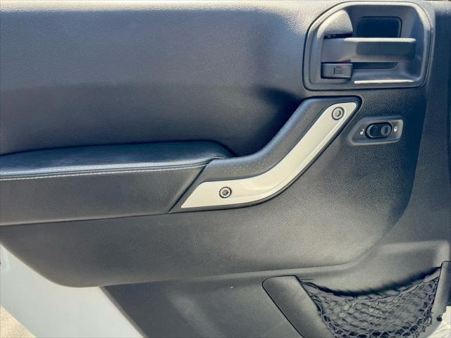 used 2014 Jeep Wrangler Unlimited car, priced at $17,772