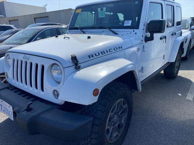 used 2015 Jeep Wrangler Unlimited car, priced at $25,923