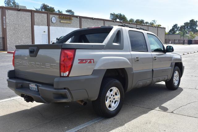 used 2002 Chevrolet Avalanche car, priced at $9,488