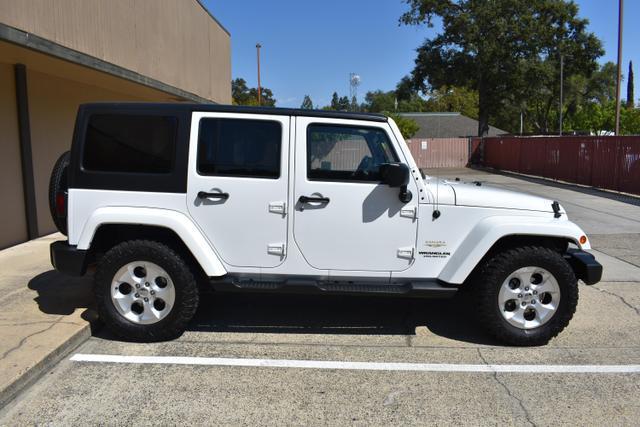 used 2013 Jeep Wrangler Unlimited car, priced at $18,988