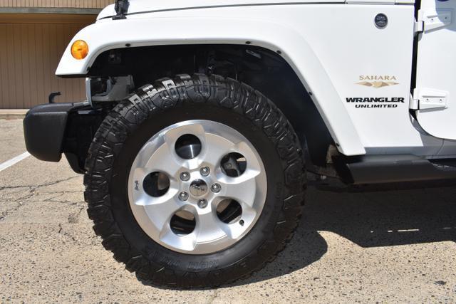 used 2013 Jeep Wrangler Unlimited car, priced at $18,988