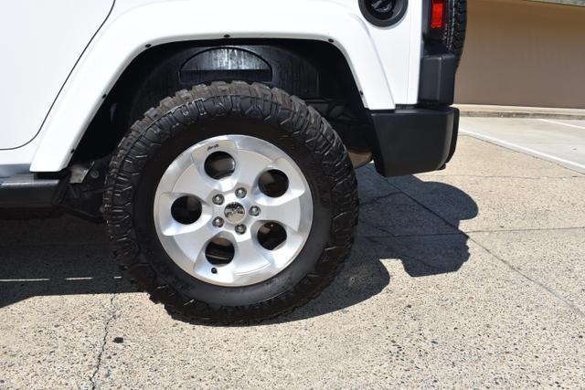 used 2013 Jeep Wrangler Unlimited car, priced at $18,988