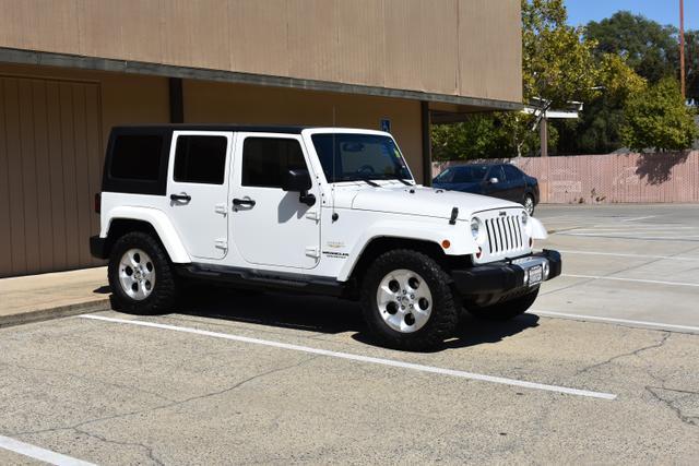 used 2013 Jeep Wrangler Unlimited car, priced at $18,988