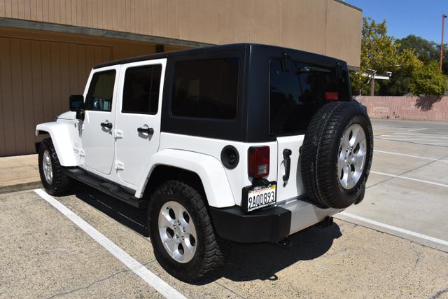 used 2013 Jeep Wrangler Unlimited car, priced at $18,988