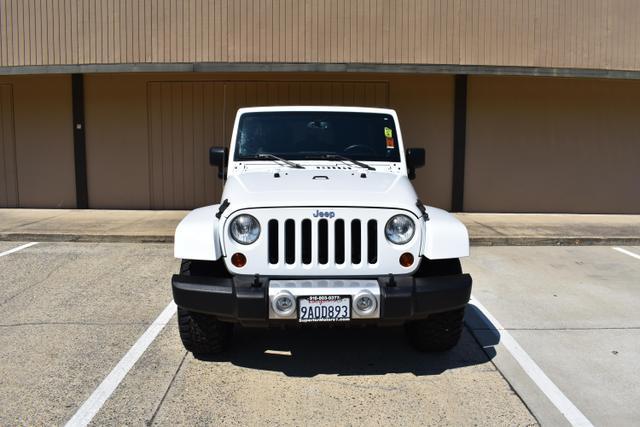 used 2013 Jeep Wrangler Unlimited car, priced at $18,988