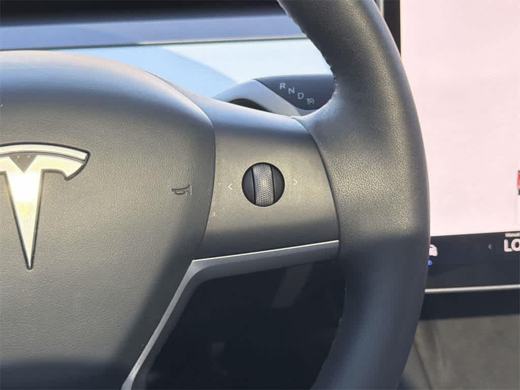 used 2025 Tesla Model Y car, priced at $38,822