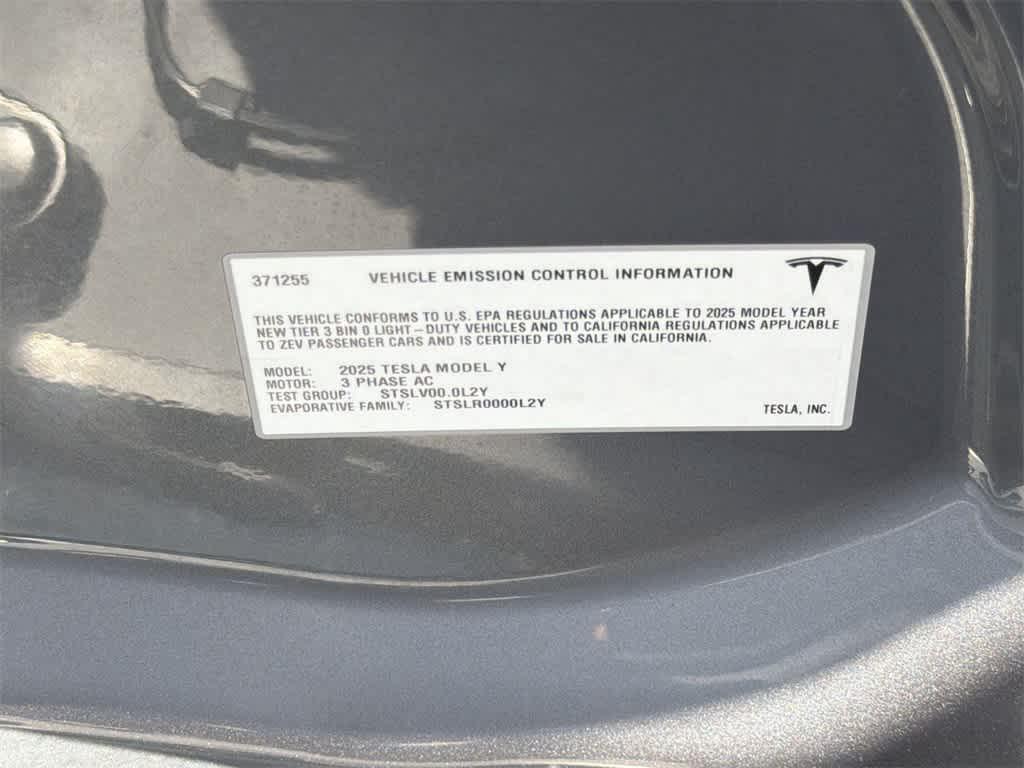 used 2025 Tesla Model Y car, priced at $38,822