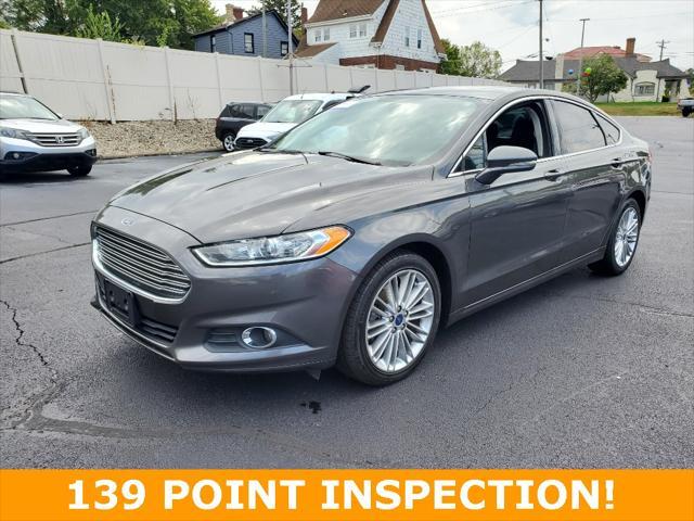 used 2016 Ford Fusion car, priced at $10,999