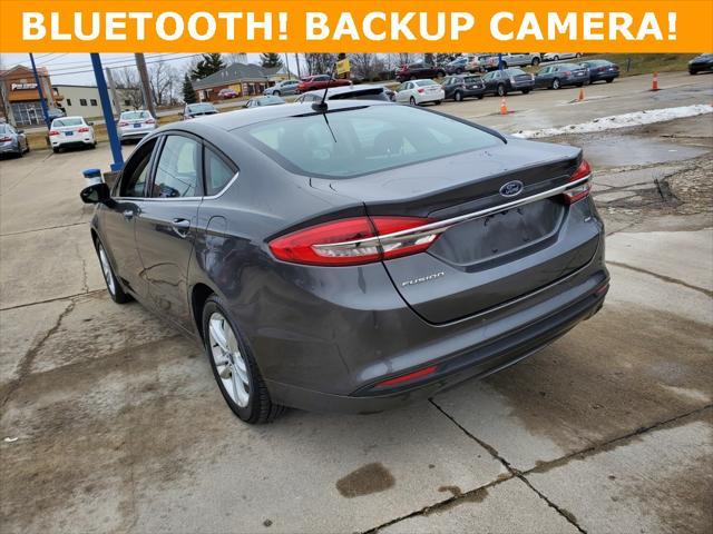 used 2018 Ford Fusion car, priced at $14,573