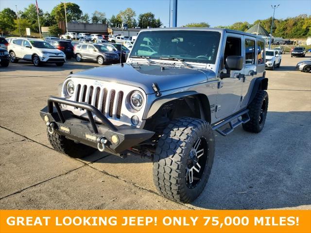 used 2014 Jeep Wrangler Unlimited car, priced at $19,695