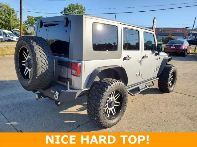 used 2014 Jeep Wrangler Unlimited car, priced at $19,695