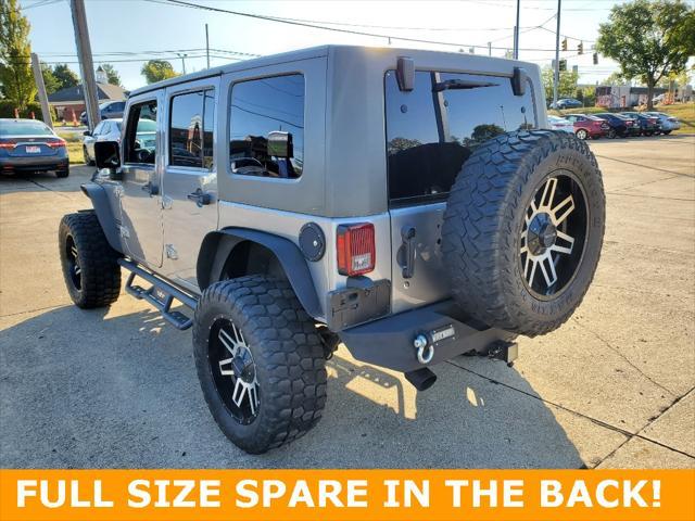 used 2014 Jeep Wrangler Unlimited car, priced at $19,695