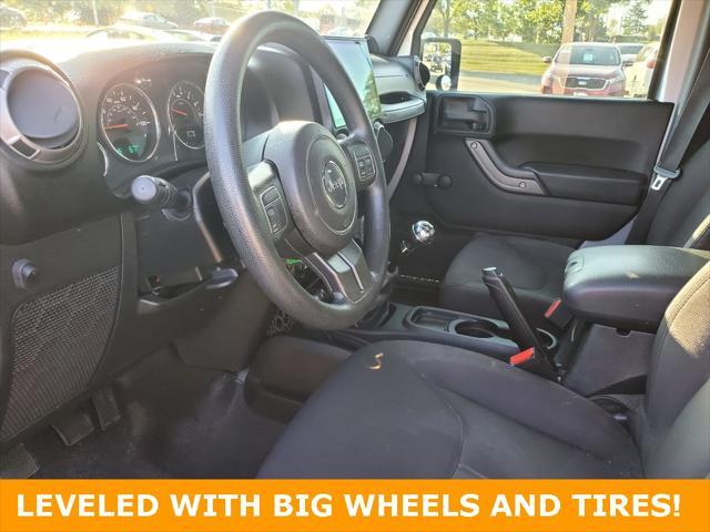 used 2014 Jeep Wrangler Unlimited car, priced at $19,695