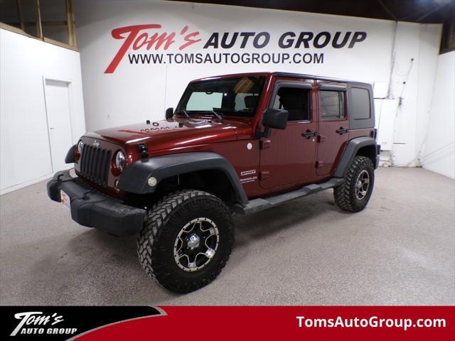 used 2010 Jeep Wrangler Unlimited car, priced at $13,995